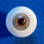 Artificial eye on a blue background