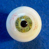 Artificial eye on a blue background